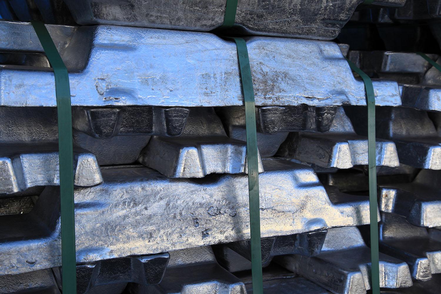 Stacked aluminium ingots prepared for industrial supply