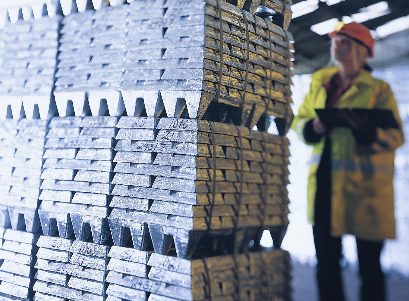 Stacked aluminium ingots in an industrial facility