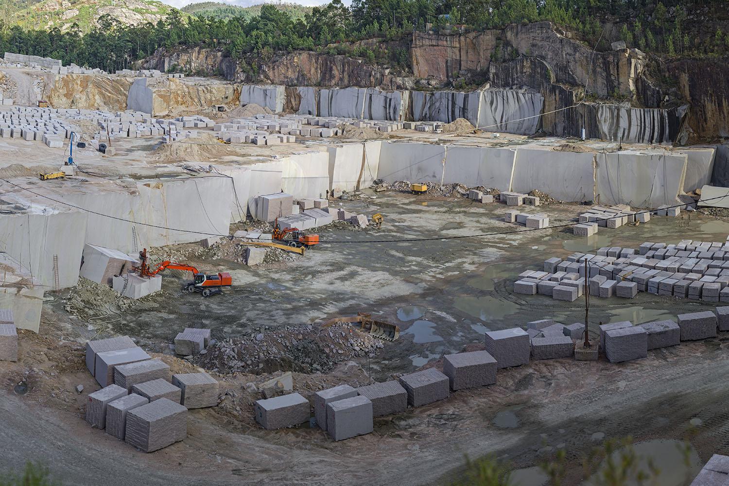 Grey natural stone blocks at a quarry