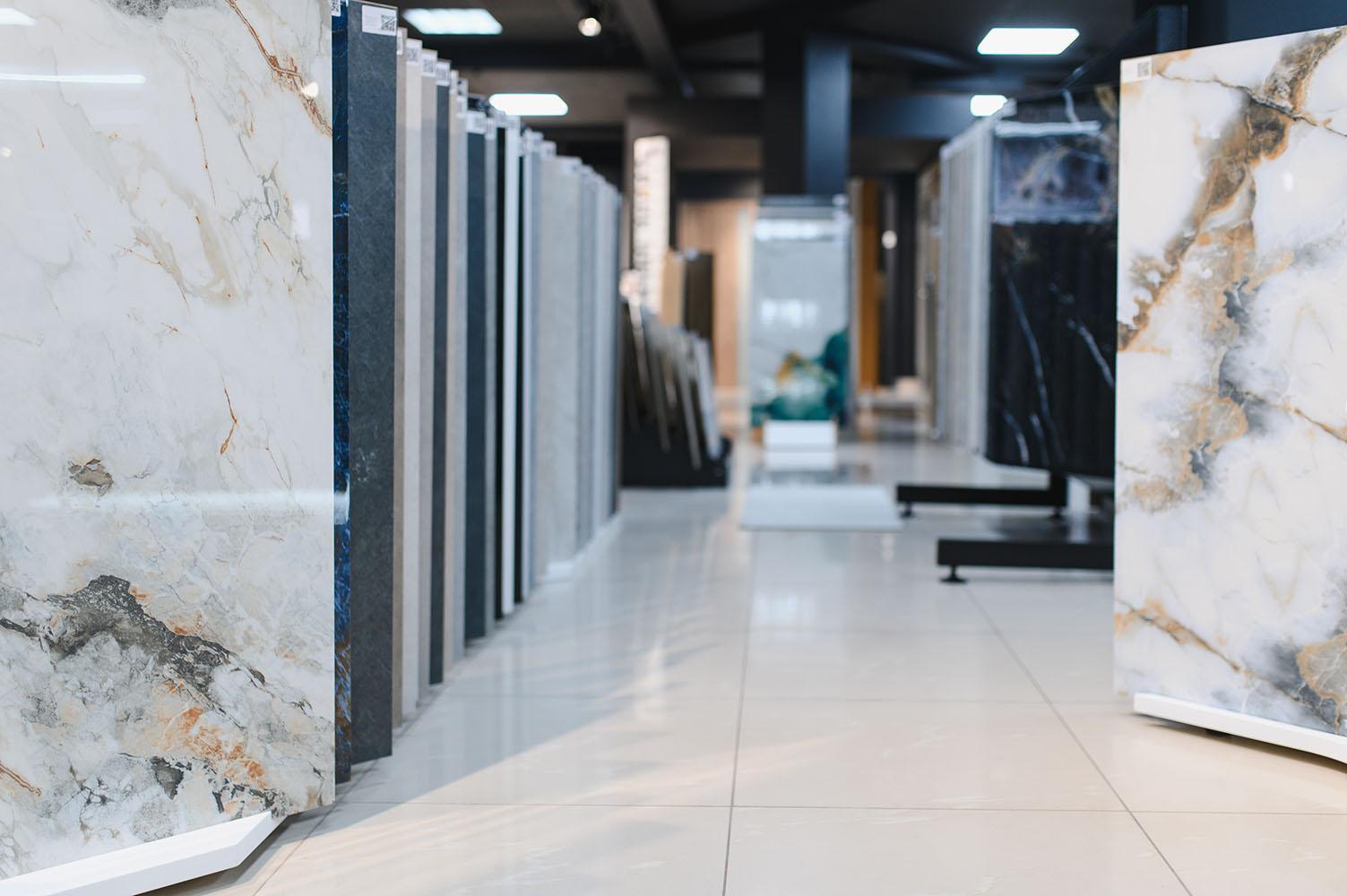 White and veined natural stone slabs on display